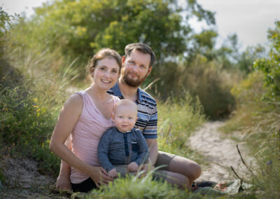 Familjefotografering vid havet nära Lund